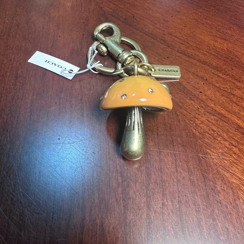 Coach Gold and Brown Mushroom Keychain